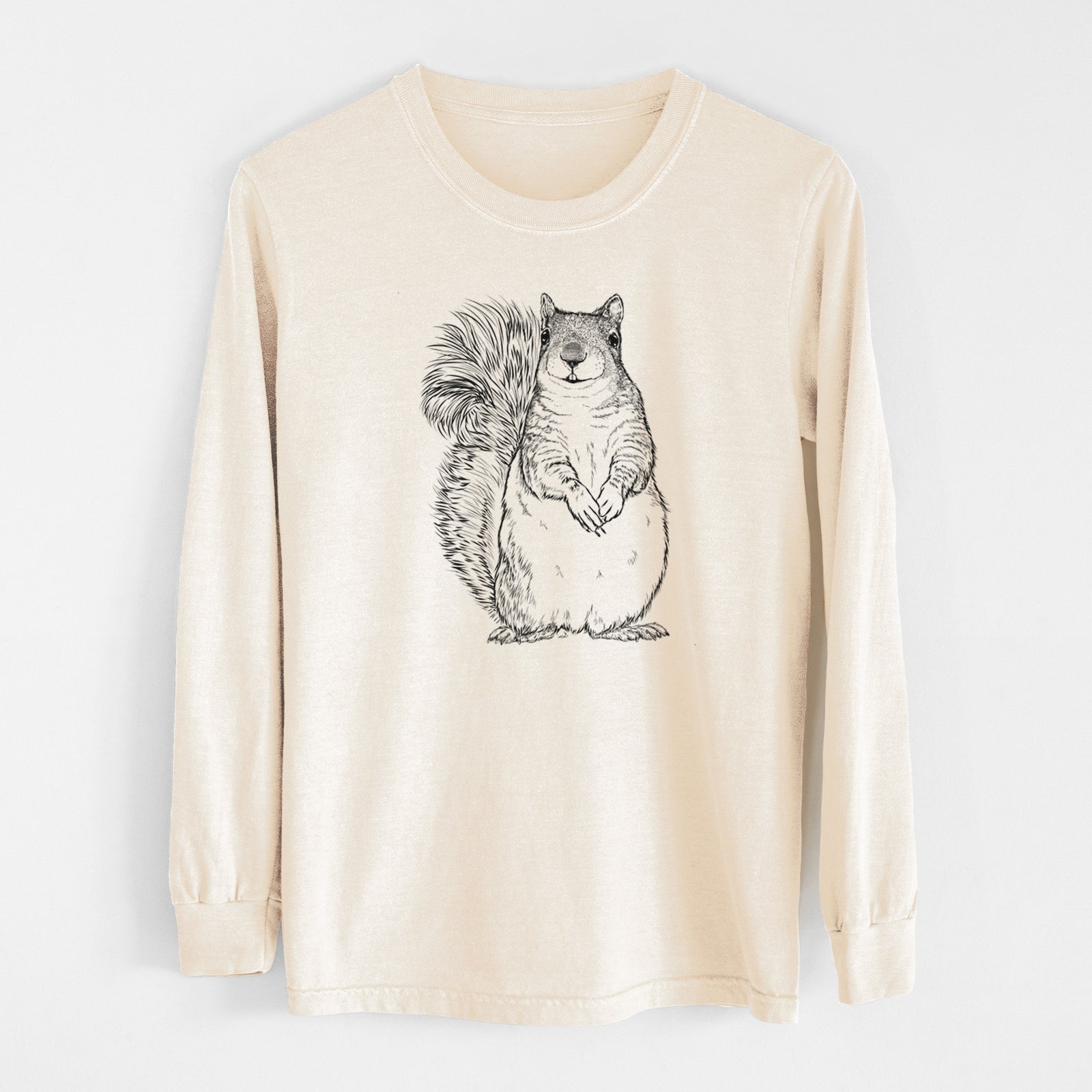 Espresso brown Comfort Colors long sleeve shirt laid flat with the cuffs rolled, printed with a detailed black ink illustration of a western grey squirrel sitting upright with a bushy tail.