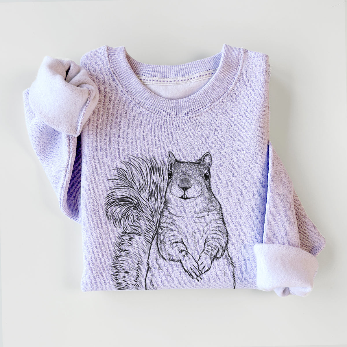 Ice purple knit sweatshirt printed with a detailed black ink illustration of a western grey squirrel sitting upright with a bushy tail, styled flat.