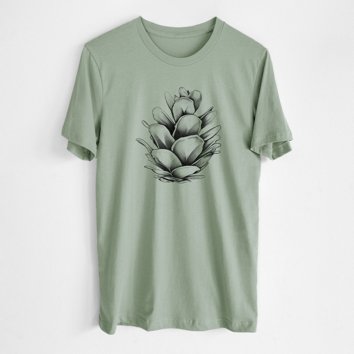 Sage green lightweight cotton t-shirt laid flat, printed with a detailed black ink illustration of a western hemlock pine cone.