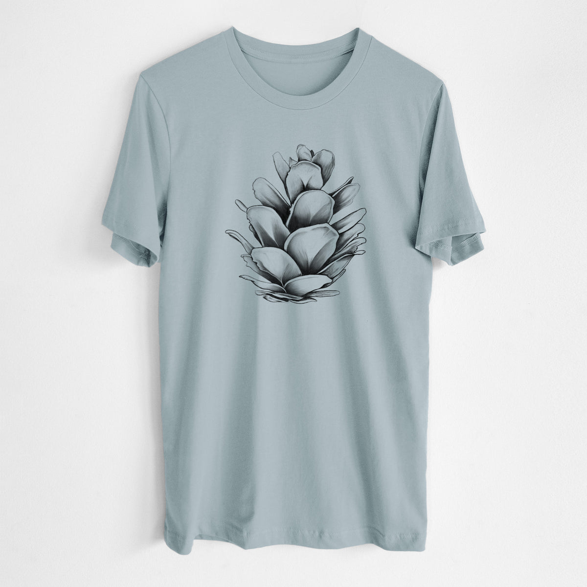 Vintage denim lightweight cotton t-shirt laid flat, printed with a detailed black ink illustration of a western hemlock pine cone.