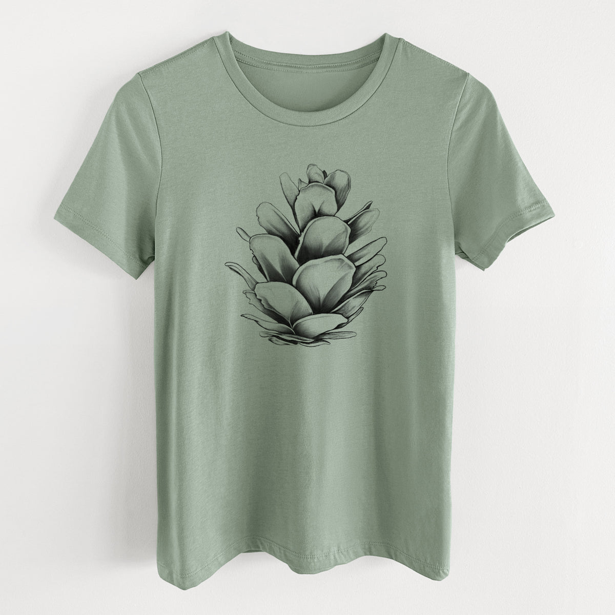 Sage green women's relaxed fit cotton t-shirt laid flat, printed with a detailed black ink illustration of a western hemlock pine cone.