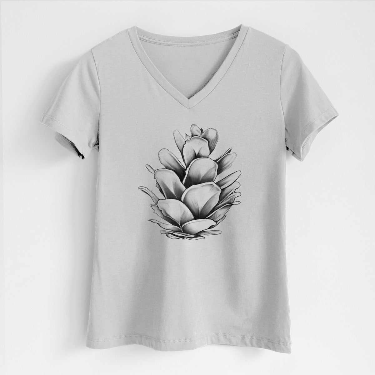 Lunar grey women's relaxed fit cotton V-neck t-shirt laid flat, printed with a detailed black ink illustration of a western hemlock pine cone.