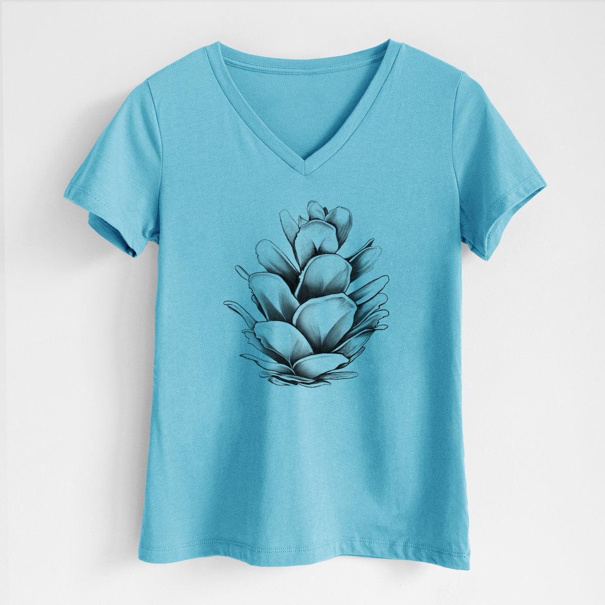 Turquoise women's relaxed fit cotton V-neck t-shirt laid flat, printed with a detailed black ink illustration of a western hemlock pine cone.