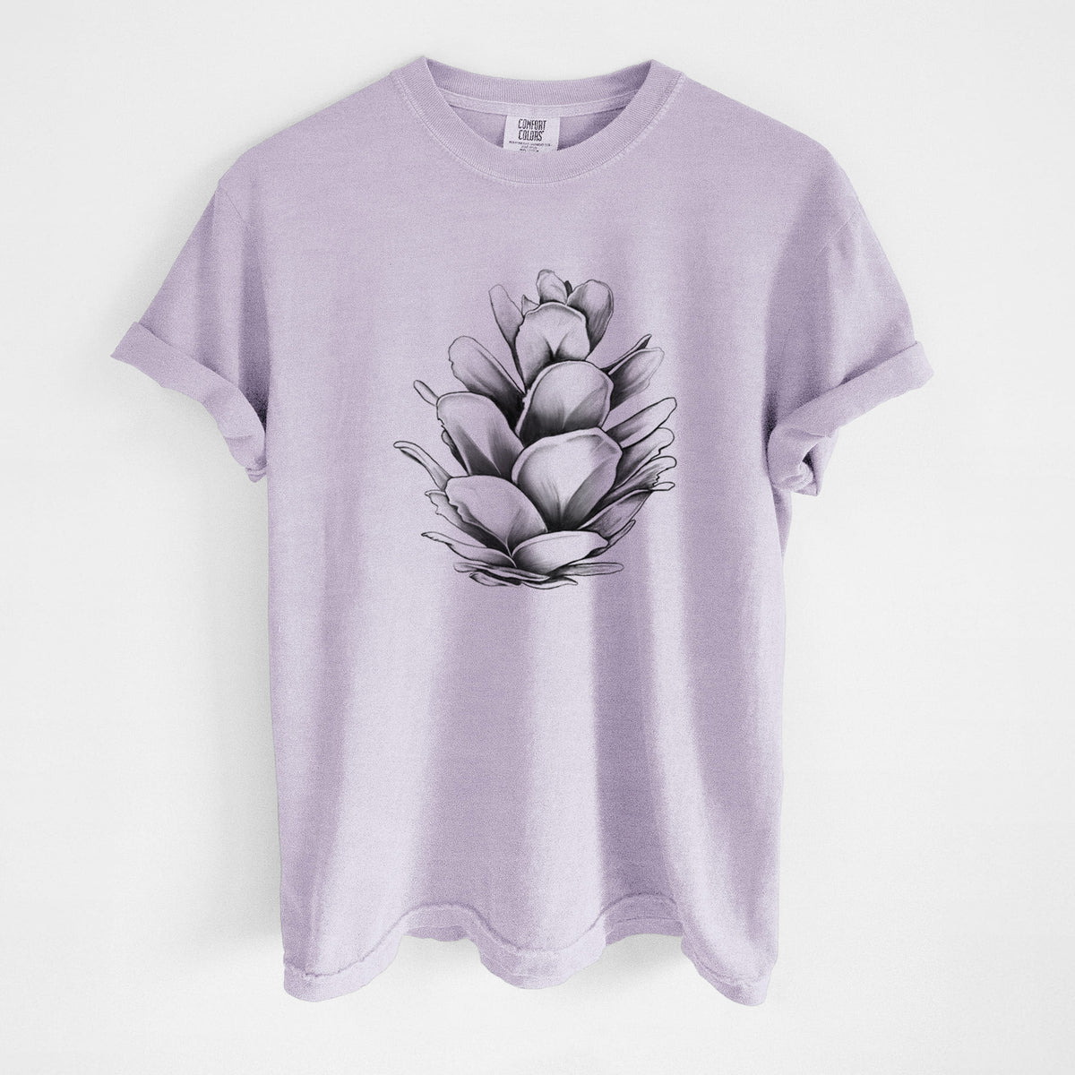 Orchid purple Comfort Colors t-shirt laid flat, printed with a detailed black ink illustration of a western hemlock pine cone.