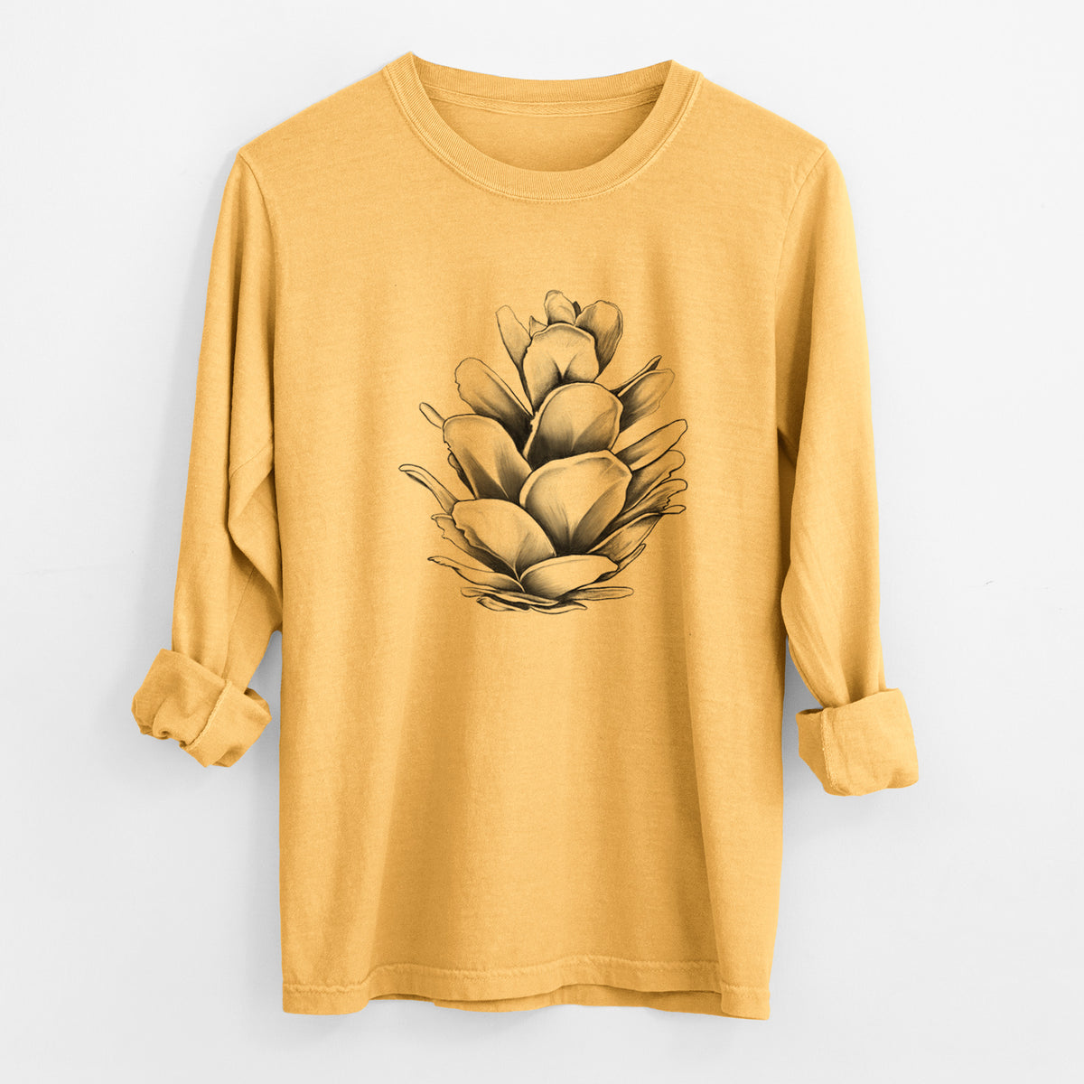 Golden wheat yellow Comfort Colors long sleeve shirt laid flat with the cuffs rolled, printed with a detailed black ink illustration of a western hemlock pine cone.