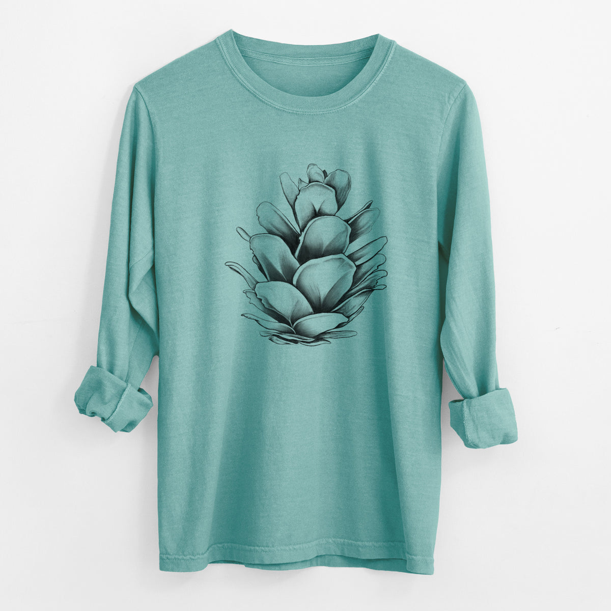 Reef green Comfort Colors long sleeve shirt laid flat with the cuffs rolled, printed with a detailed black ink illustration of a western hemlock pine cone.