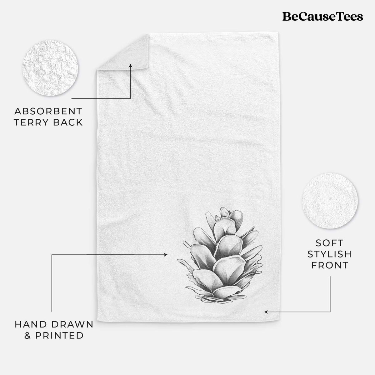 White hand towel printed with a detailed black ink illustration of a western hemlock pine cone.