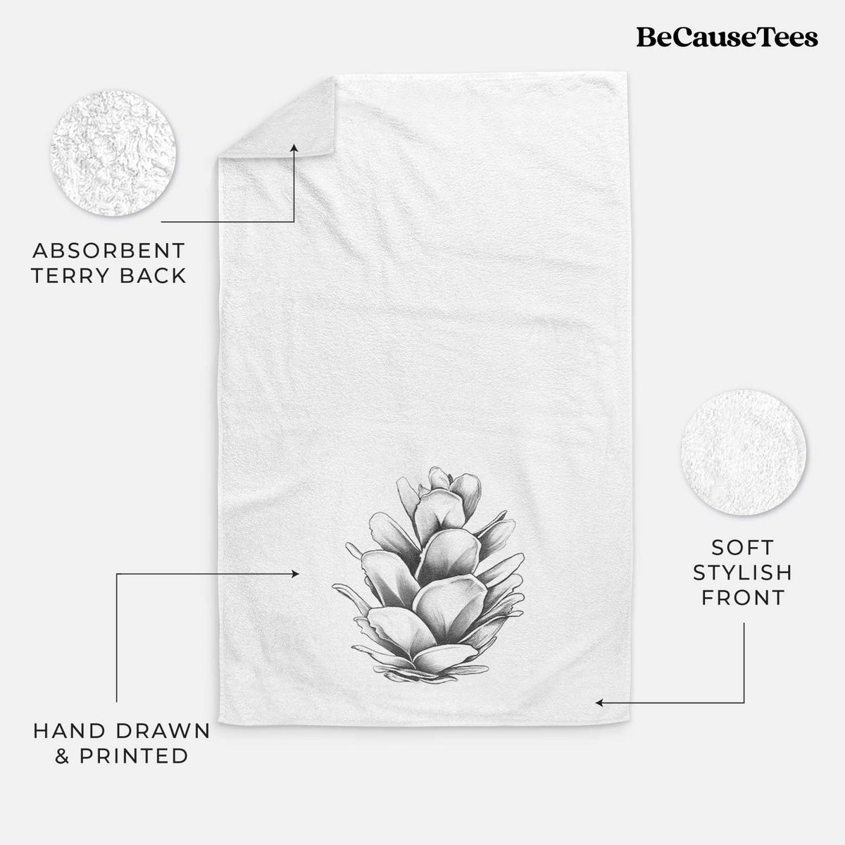 White hand towel printed with a detailed black ink illustration of a western hemlock pine cone.