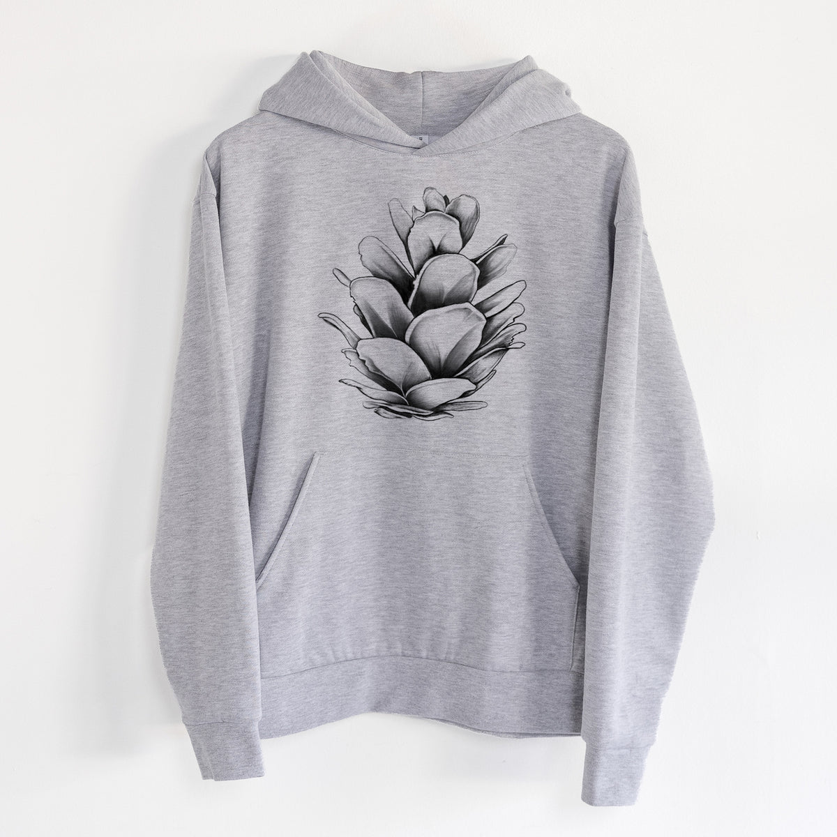 Tsuga heterophylla - Western Hemlock Pine Cone - Statement Midweight Hoodie in Heather Grey, hanging on a white wall, with a front kangaroo pocket and no drawcords.