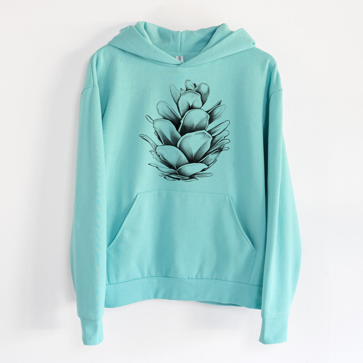 Tsuga heterophylla - Western Hemlock Pine Cone - Statement Midweight Hoodie in Seafoam, hanging on a white wall, with a front kangaroo pocket and no drawcords.