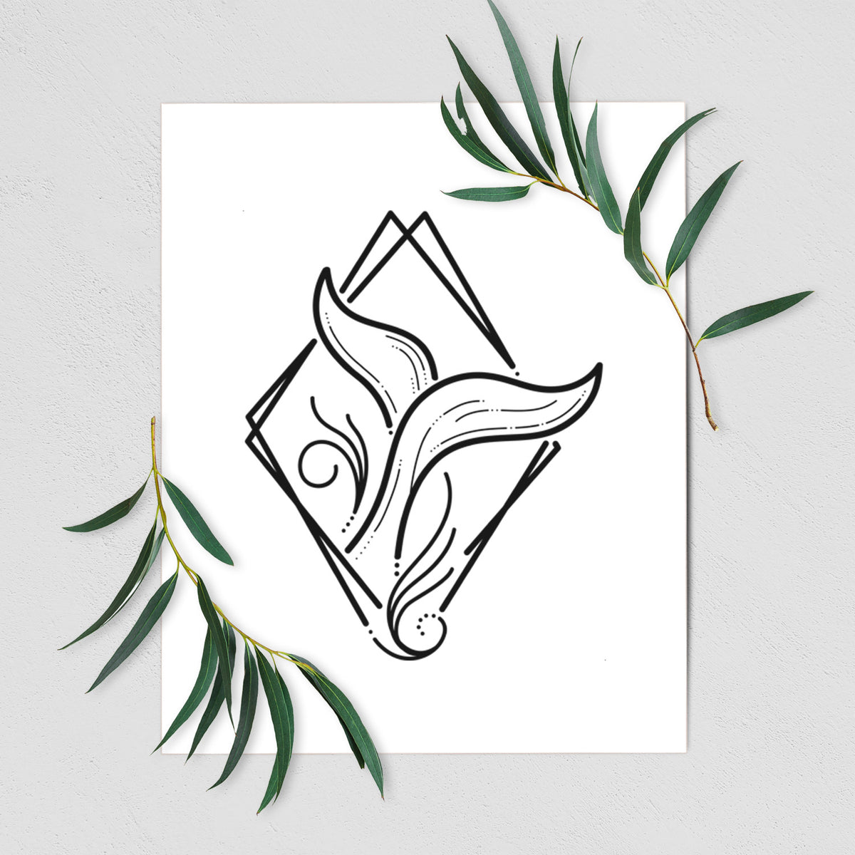 Art print of a black line art whale tail rising from a wave inside a diamond outline, shown with eucalyptus leaves.