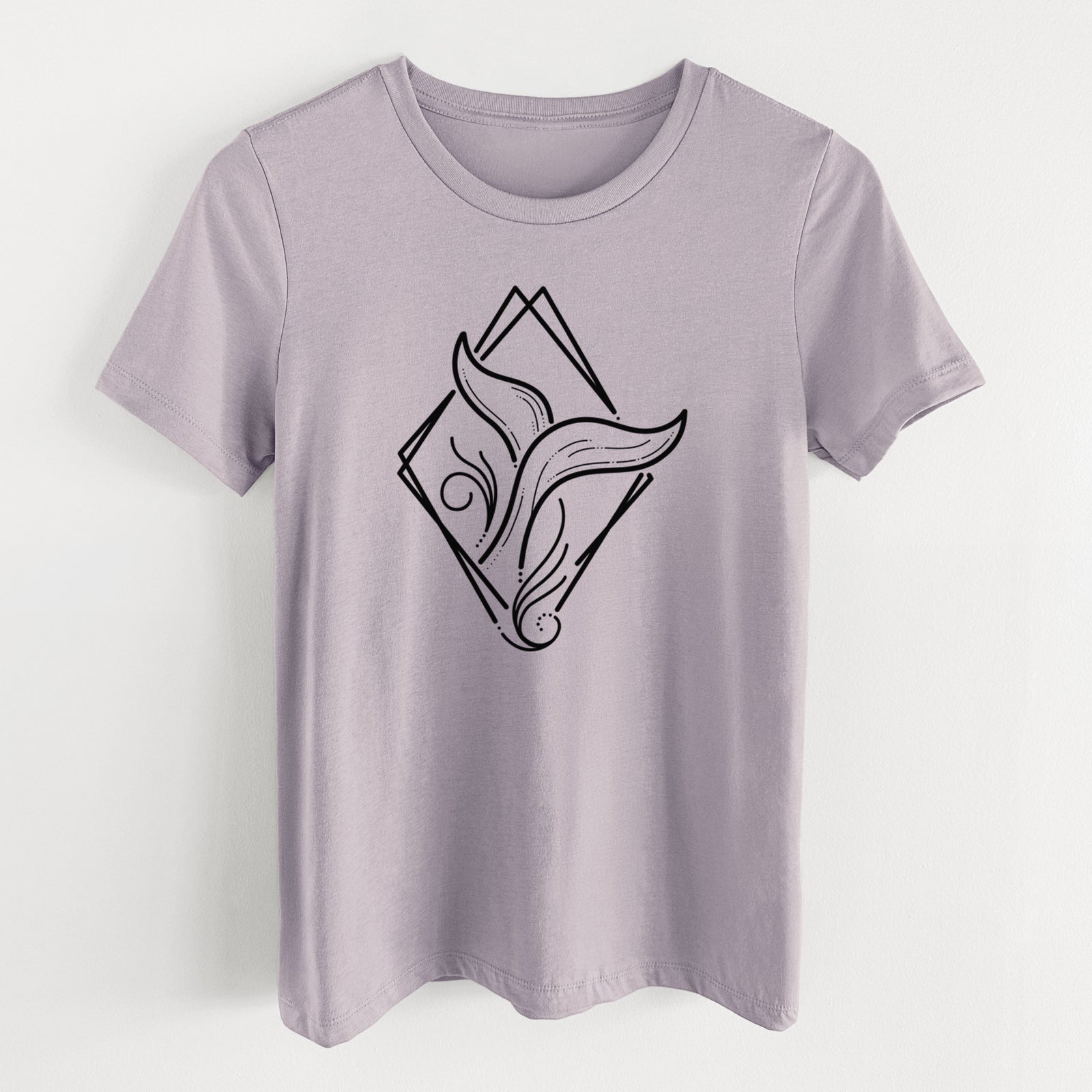 Light violet women's relaxed fit cotton t-shirt laid flat, printed with a black line art whale tail rising from a wave inside a diamond outline.