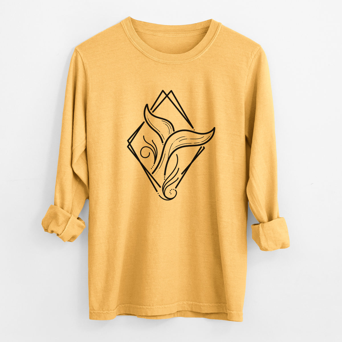 Golden wheat yellow Comfort Colors long sleeve shirt laid flat with the cuffs rolled, printed with a black line art whale tail rising from a wave inside a diamond outline.