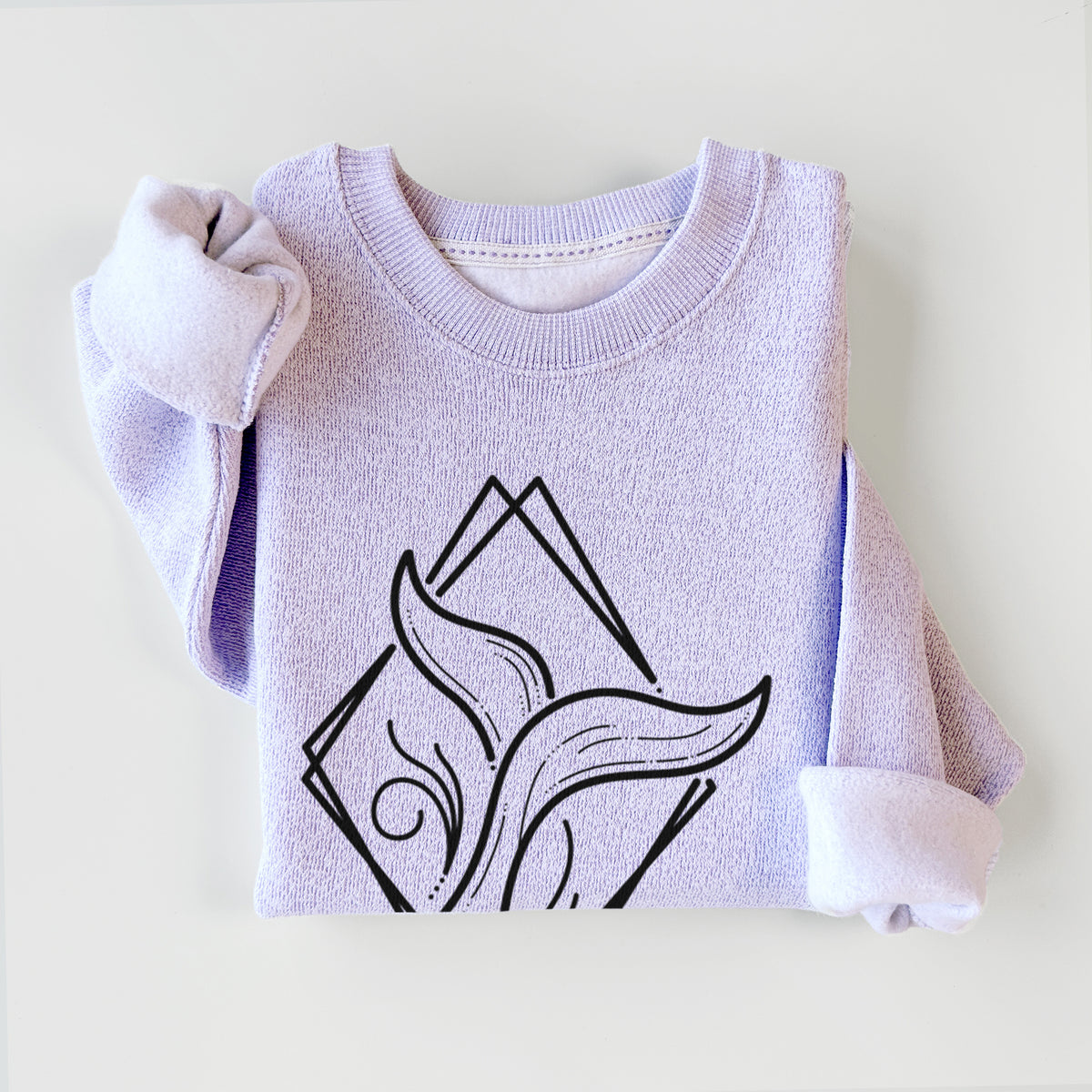 Ice purple knit sweatshirt printed with a black line art whale tail rising from a wave inside a diamond outline, styled flat.