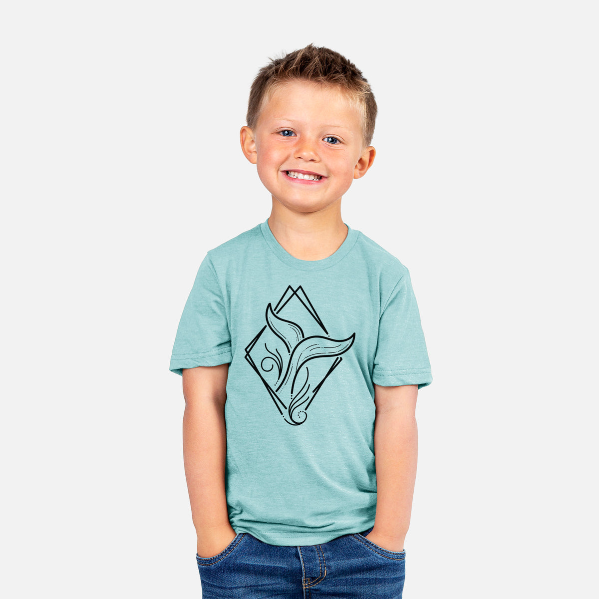 Smiling boy wearing a youth t-shirt printed with a black line art whale tail rising from a wave inside a diamond outline.