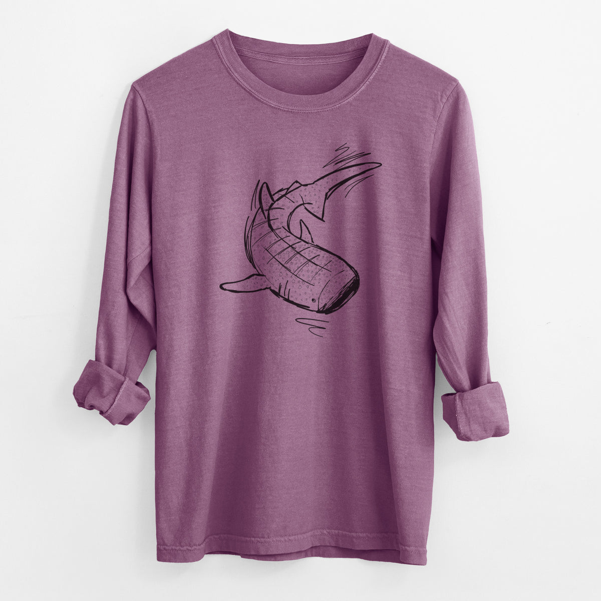 Berry pink Comfort Colors long sleeve shirt laid flat with the cuffs rolled, printed with a black ink illustration of a spotted whale shark swimming.
