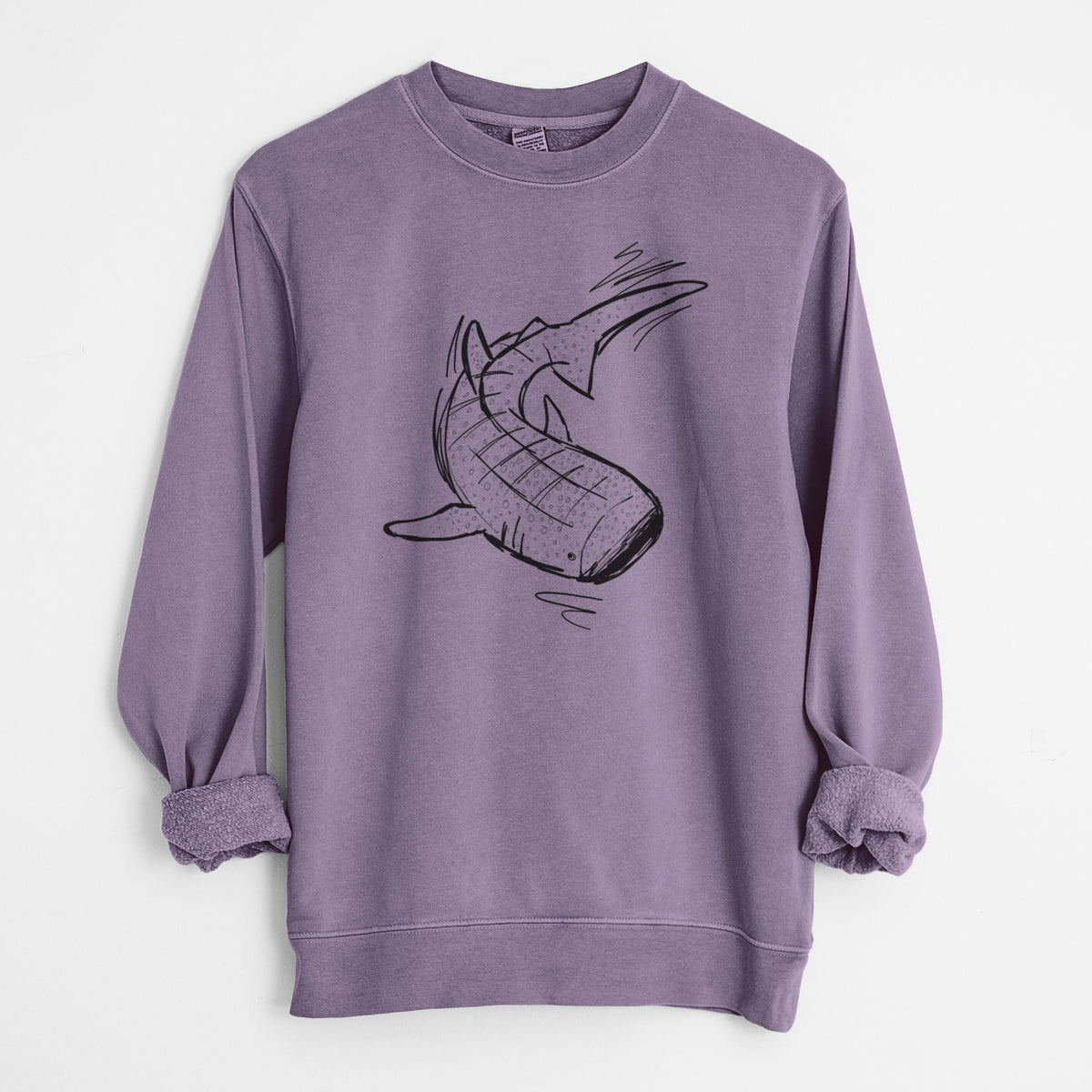 Plum purple pigment dyed crewneck sweatshirt laid flat with the sleeves rolled, printed with a black ink illustration of a spotted whale shark swimming.