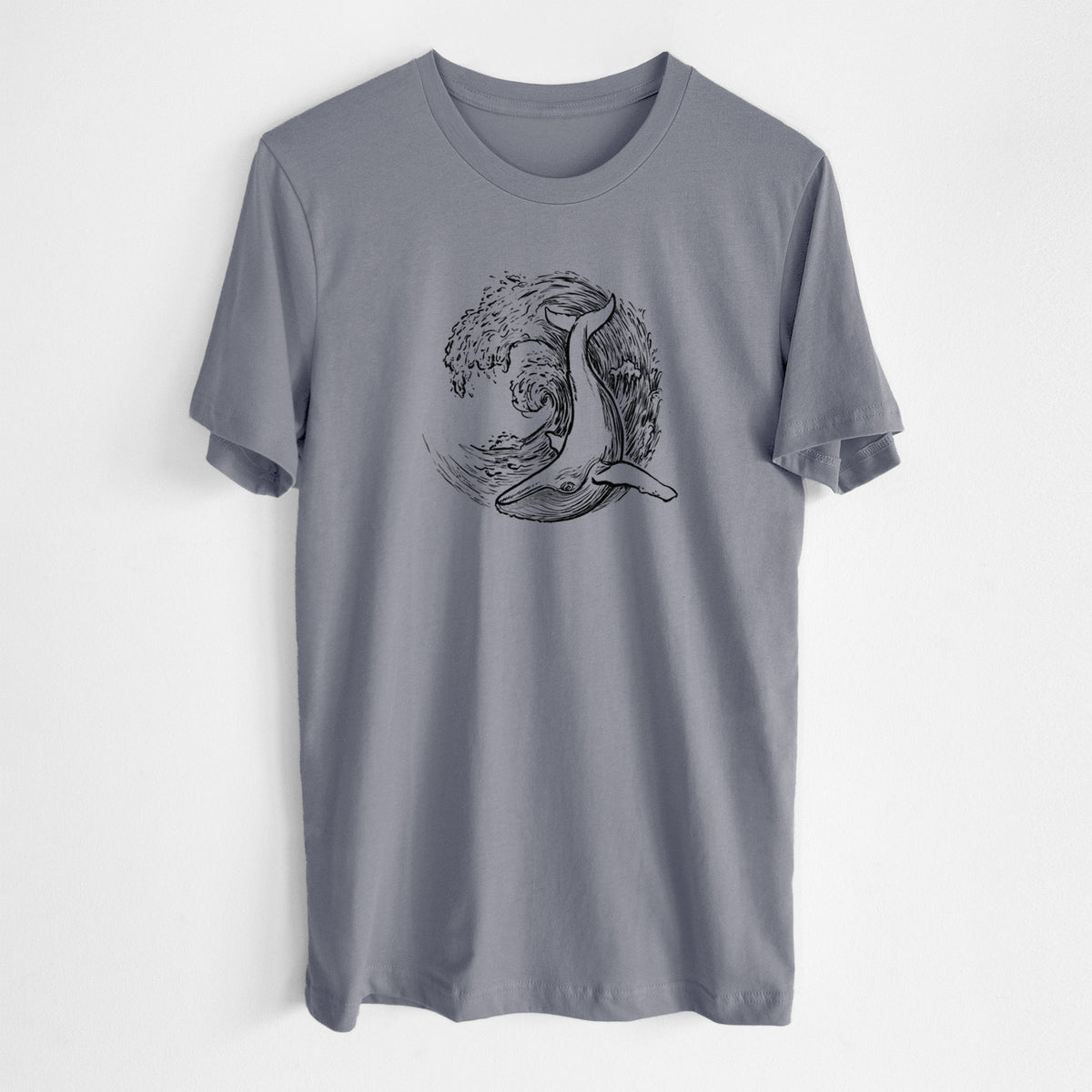 Storm grey lightweight cotton t-shirt laid flat, printed with a black ink illustration of a humpback whale swimming inside a curling ocean wave.