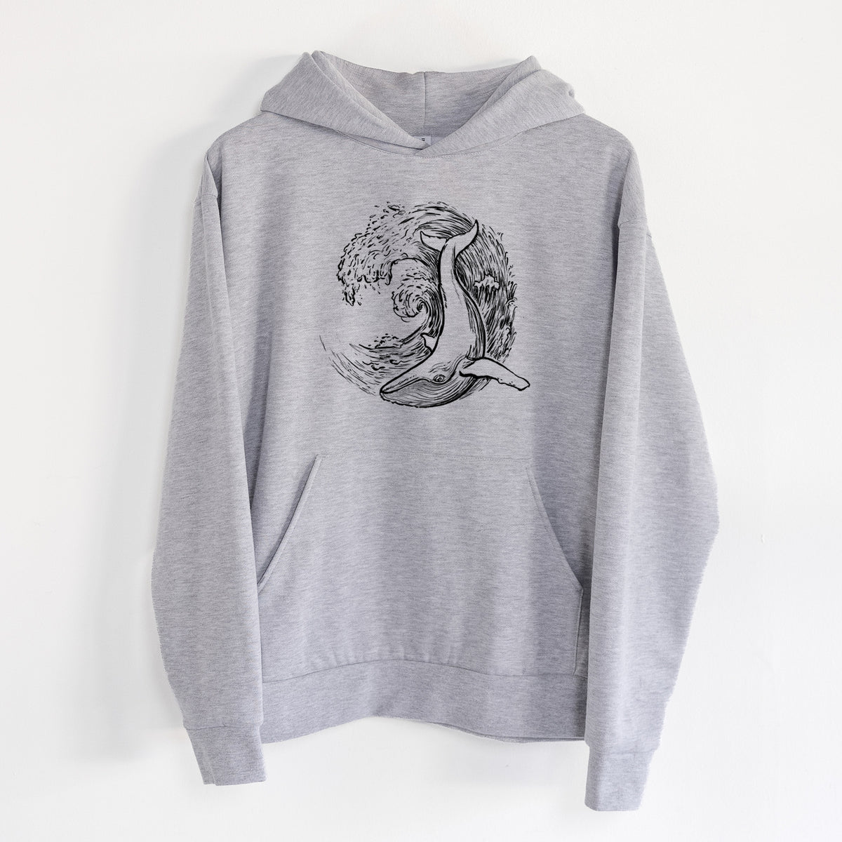 Whale Wave - Statement Midweight Hoodie in Heather Grey, hanging on a white wall, with a front kangaroo pocket and no drawcords.