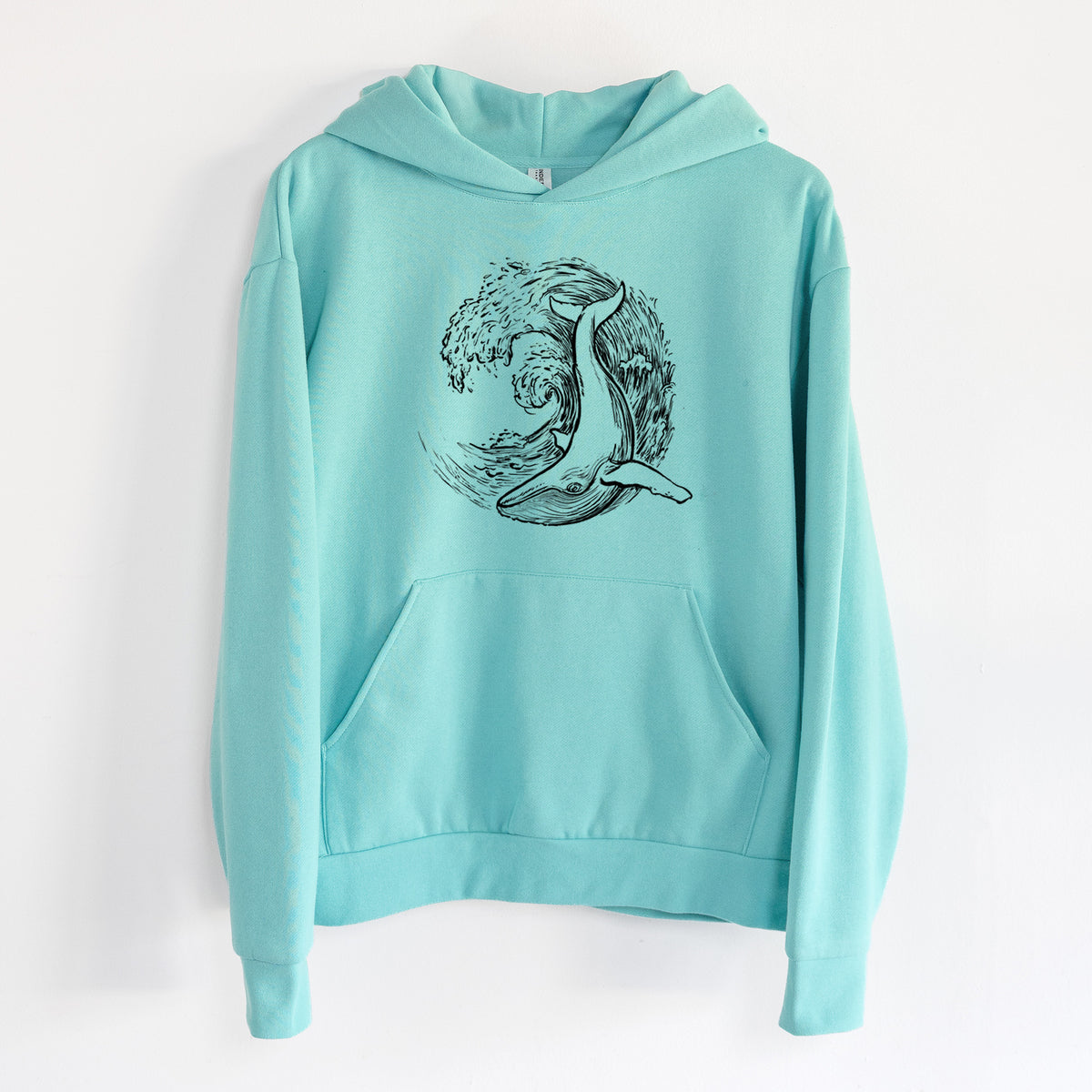 Whale Wave - Statement Midweight Hoodie in Seafoam, hanging on a white wall, with a front kangaroo pocket and no drawcords.