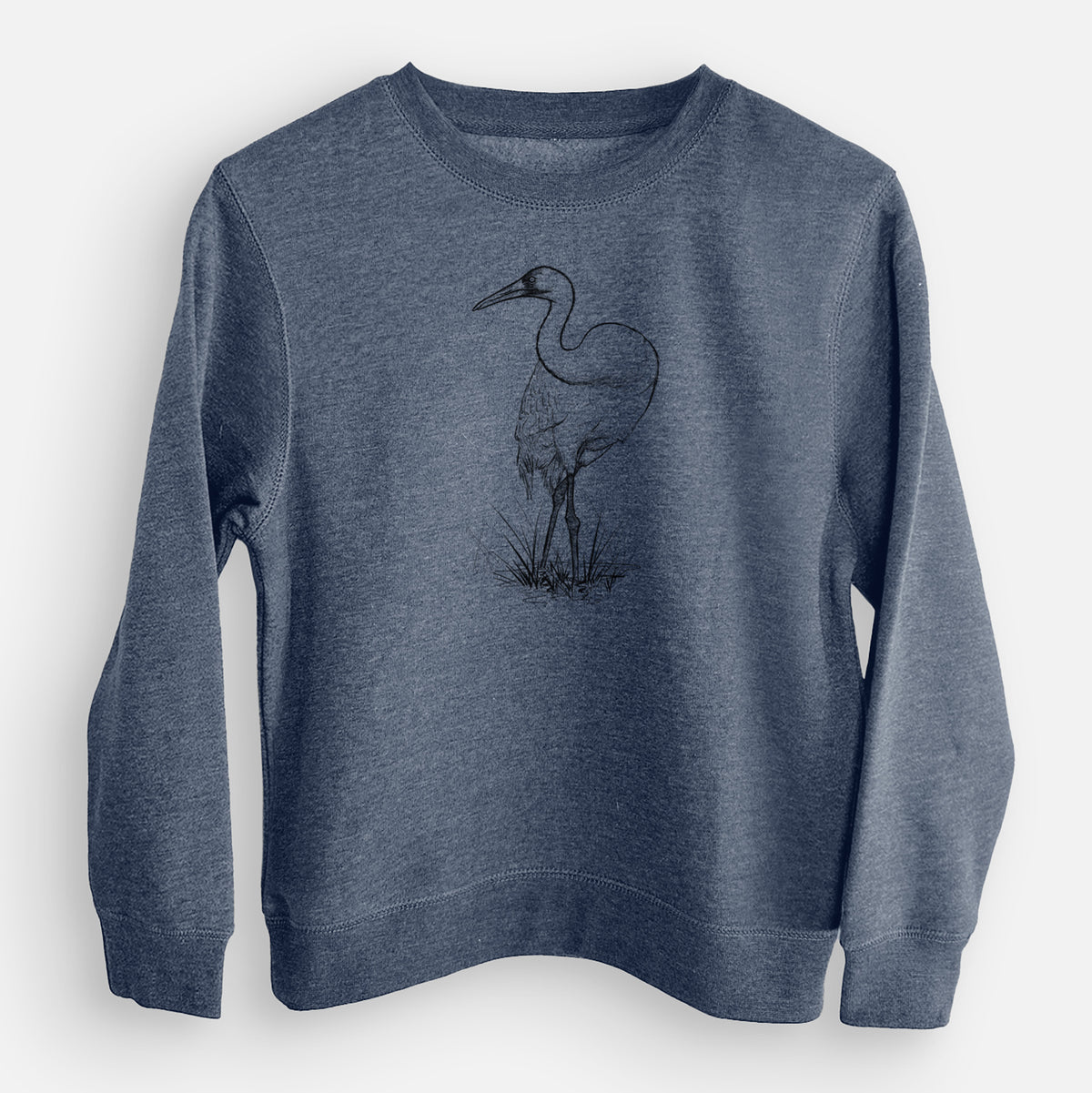 Storm blue youth crewneck sweatshirt laid flat, printed with a detailed black ink illustration of a whooping crane standing in grass.