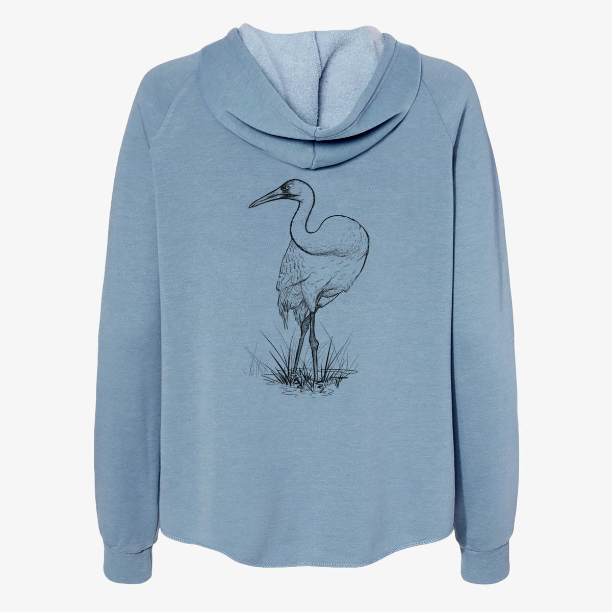Misty blue women's Cali Wave zip-up sweatshirt laid flat, printed with a detailed black ink illustration of a whooping crane standing in grass.