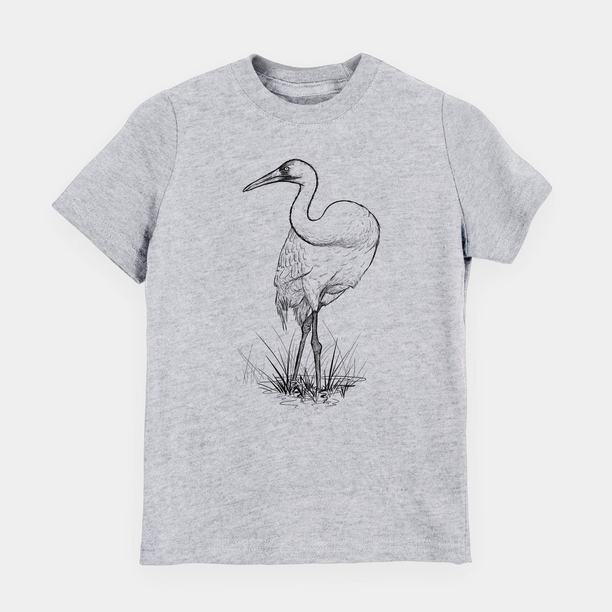 Heather grey youth t-shirt laid flat, printed with a detailed black ink illustration of a whooping crane standing in grass.