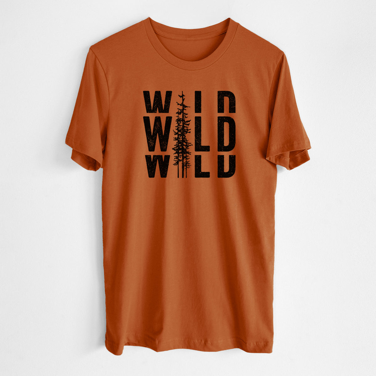 Autumn lightweight cotton t-shirt laid flat, printed with bold black text reading WILD stacked three times, with a tall pine tree forming the letter I.