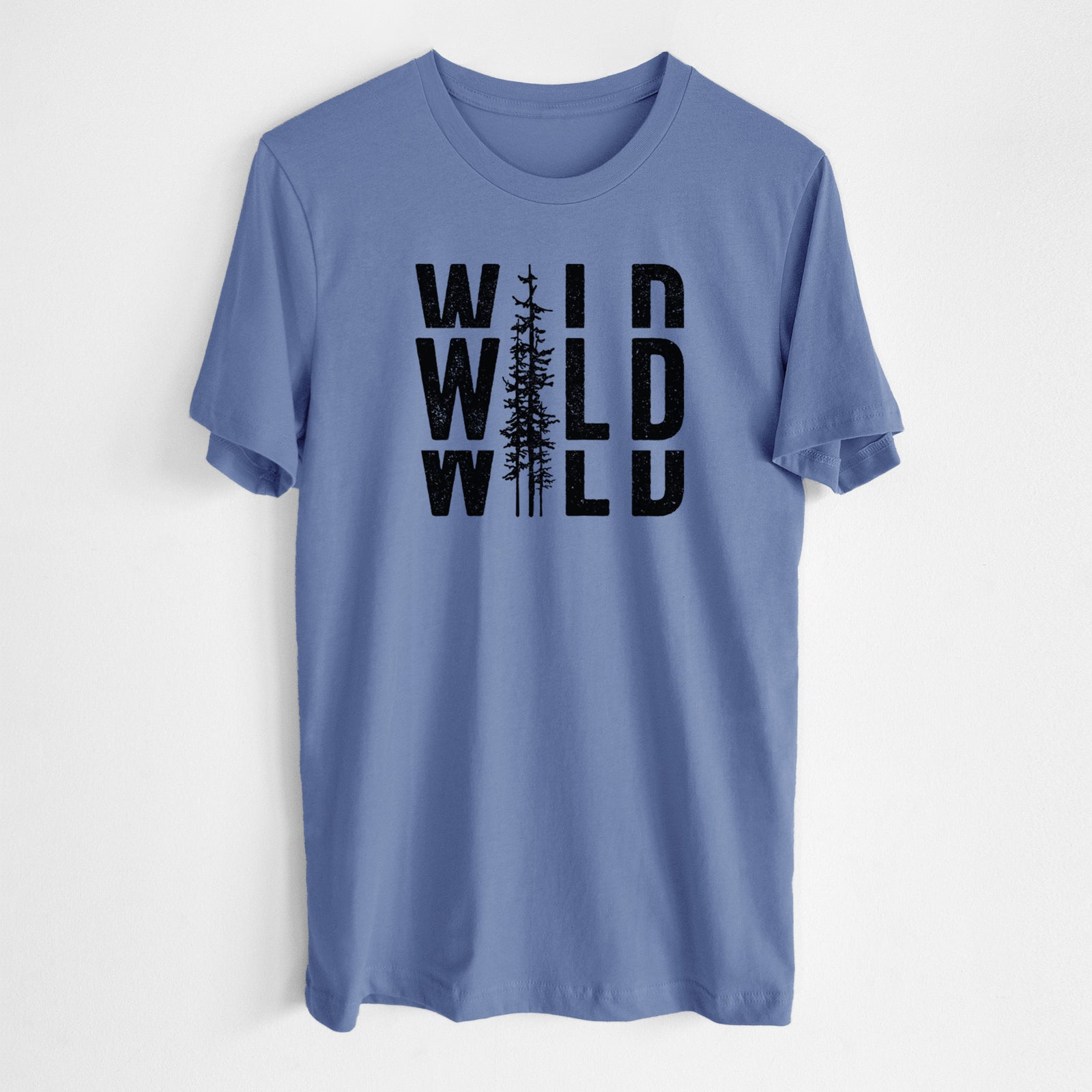 Blue bell lightweight cotton t-shirt laid flat, printed with bold black text reading WILD stacked three times, with a tall pine tree forming the letter I.