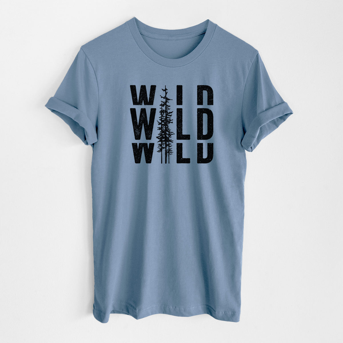 Steel blue lightweight cotton t-shirt laid flat, printed with bold black text reading WILD stacked three times, with a tall pine tree forming the letter I.