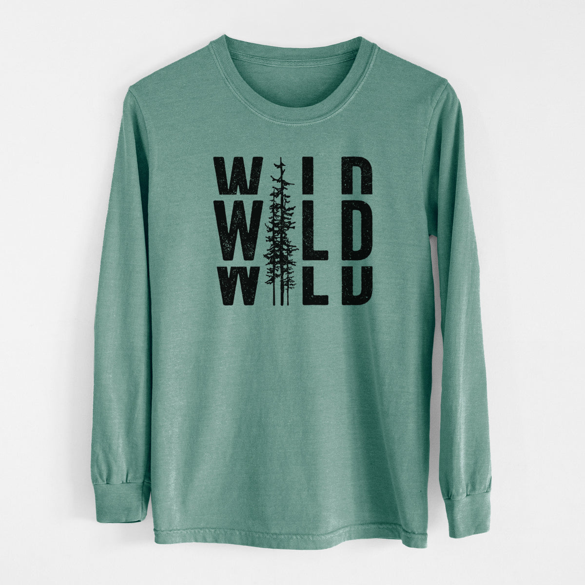 Pine green Comfort Colors long sleeve shirt laid flat, printed with bold black text reading WILD stacked three times, with a tall pine tree forming the letter I.