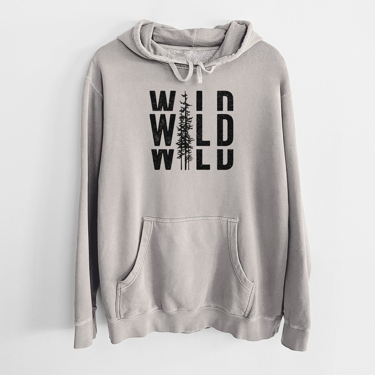 Cement grey pigment dyed hoodie laid flat, printed with bold black text reading WILD stacked three times, with a tall pine tree forming the letter I.