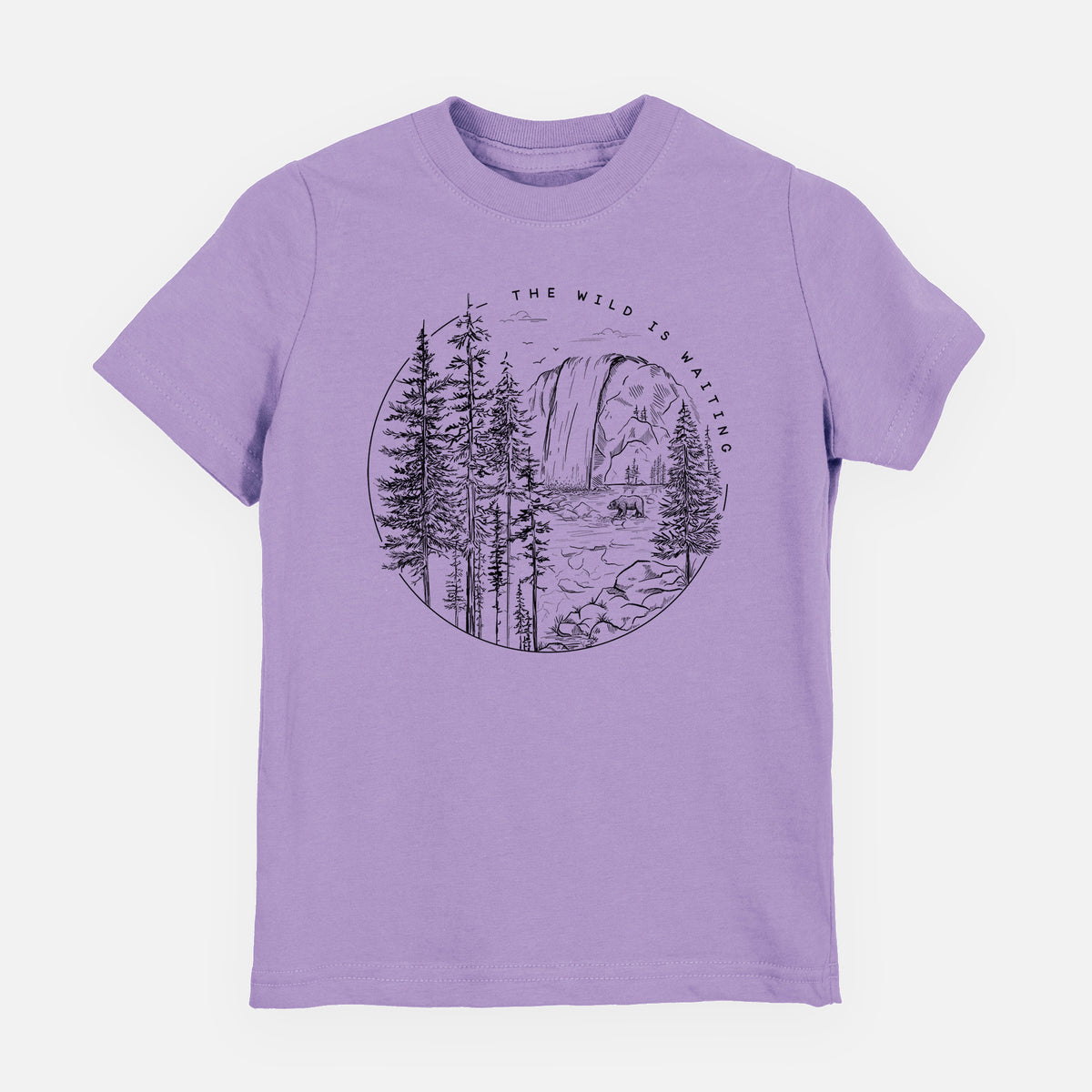 Lavender youth t-shirt laid flat, printed with a round black ink scene of a waterfall, pine trees and a river, with the words The Wild Is Waiting.
