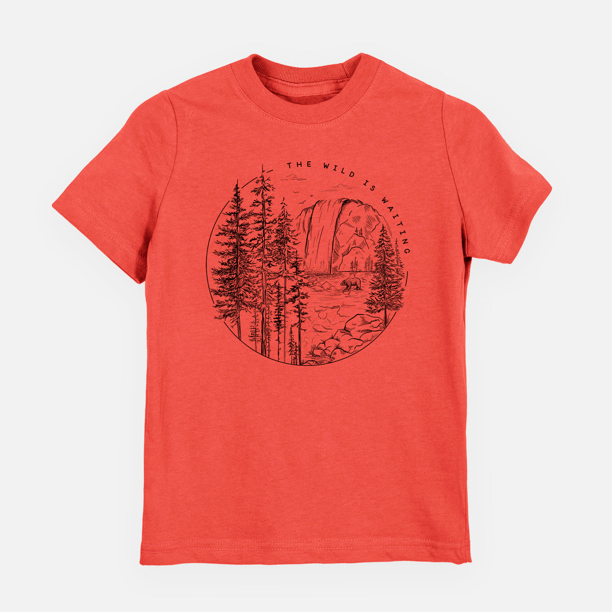 Passionfruit pink youth t-shirt laid flat, printed with a round black ink scene of a waterfall, pine trees and a river, with the words The Wild Is Waiting.
