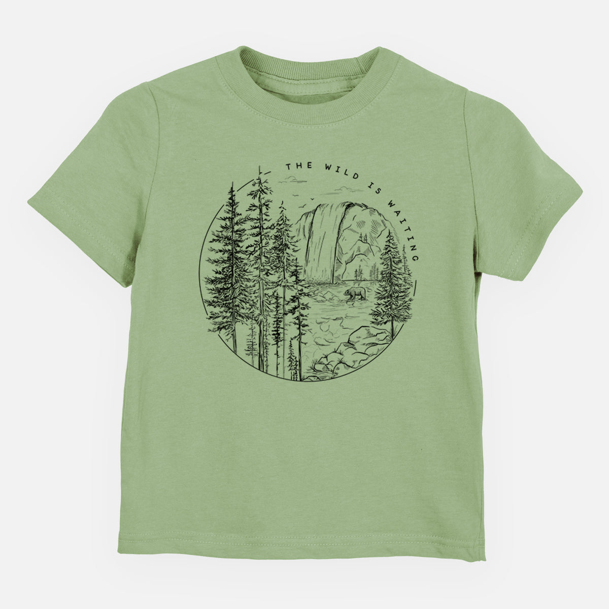 Sage green toddler t-shirt laid flat, printed with a round black ink scene of a waterfall, pine trees and a river, with the words The Wild Is Waiting.