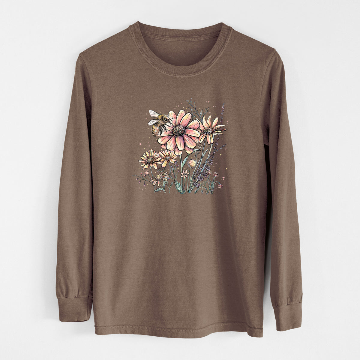 Espresso brown Comfort Colors long sleeve shirt laid flat, printed with a soft full-color illustration of a bee flying over pink and purple wildflowers.