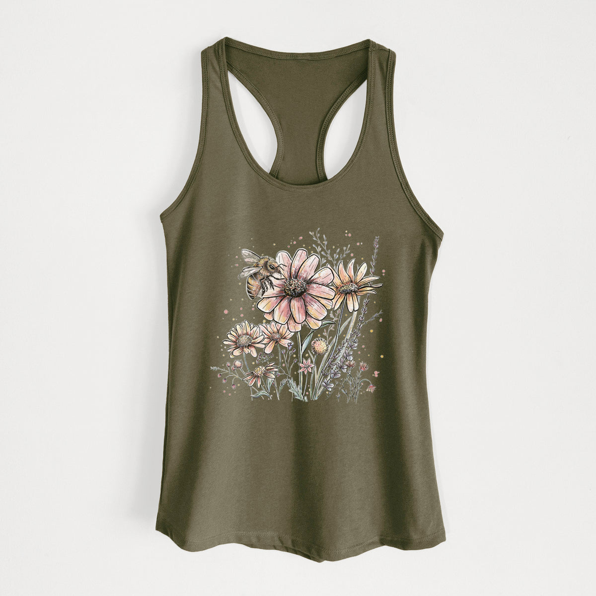 Military green women's racerback tank top laid flat, printed with a soft full-color illustration of a bee flying over pink and purple wildflowers.