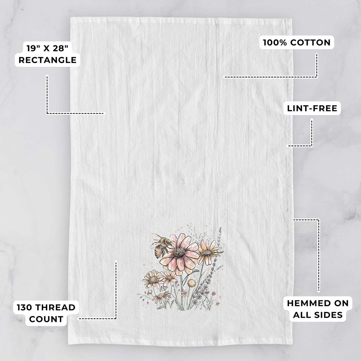 White tea towel printed with a soft full-color illustration of a bee flying over pink and purple wildflowers, with feature labels: 19 by 28 inch rectangle, 100% cotton, lint-free, 130 thread count, hemmed on all sides.