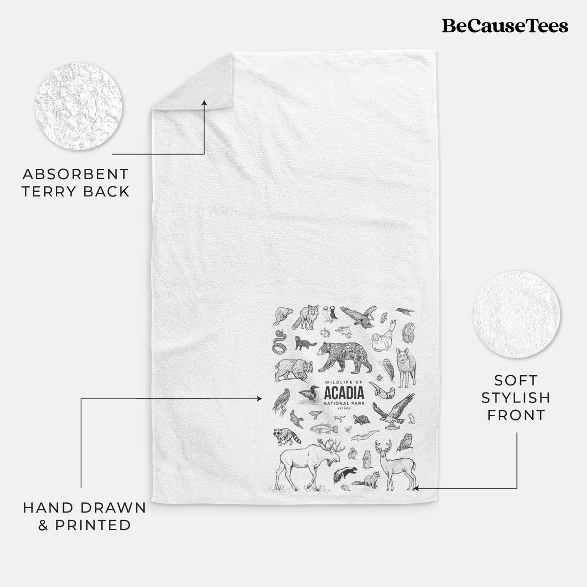 White hand towel printed with a collection of black ink wildlife illustrations surrounding the words Acadia National Park.