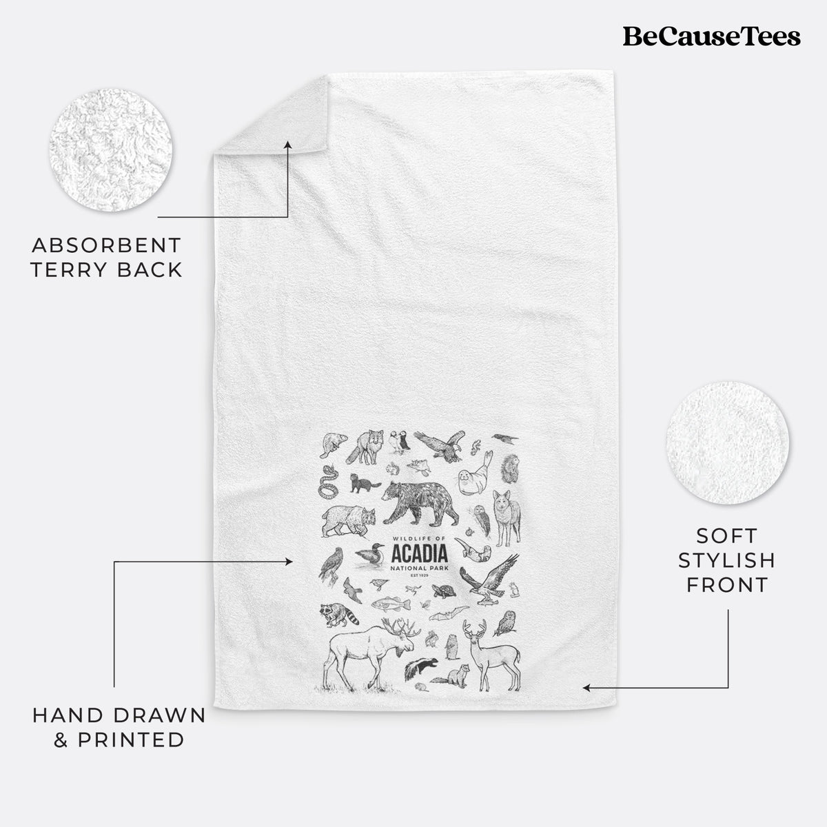 White hand towel printed with a collection of black ink wildlife illustrations surrounding the words Acadia National Park.