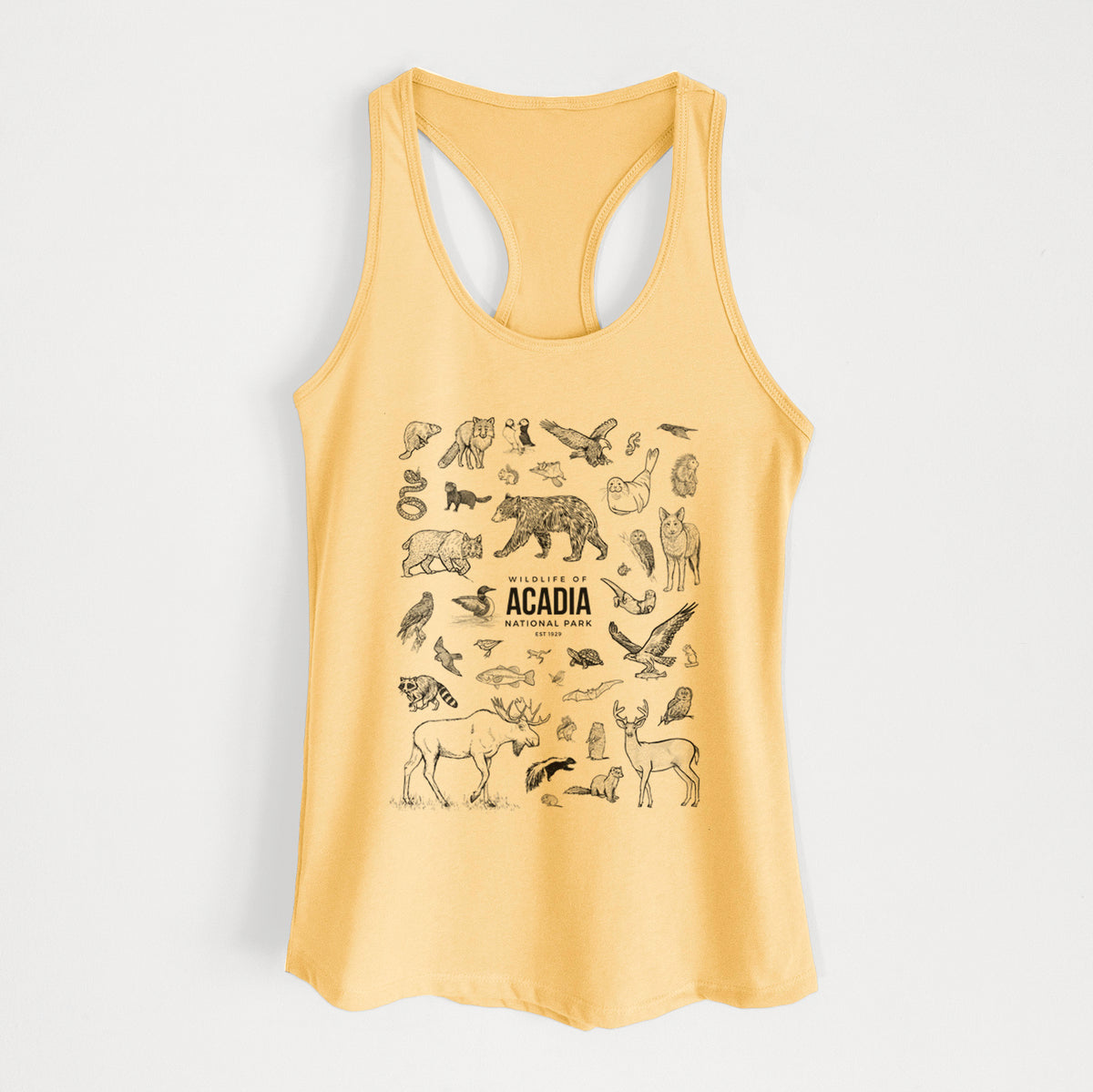 Banana cream women's racerback tank top laid flat, printed with a collection of black ink wildlife illustrations surrounding the words Acadia National Park.