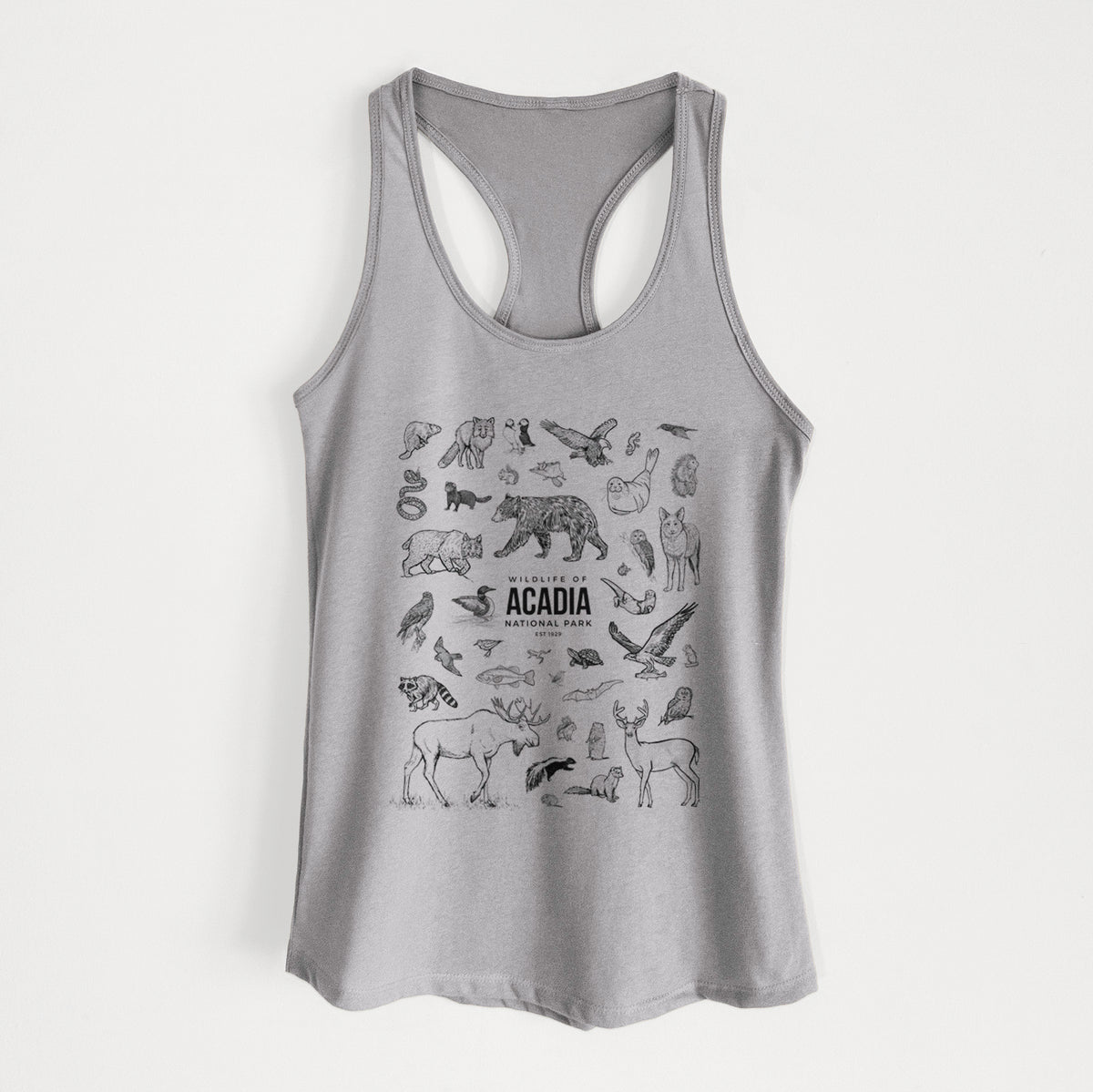 Heather grey women's racerback tank top laid flat, printed with a collection of black ink wildlife illustrations surrounding the words Acadia National Park.