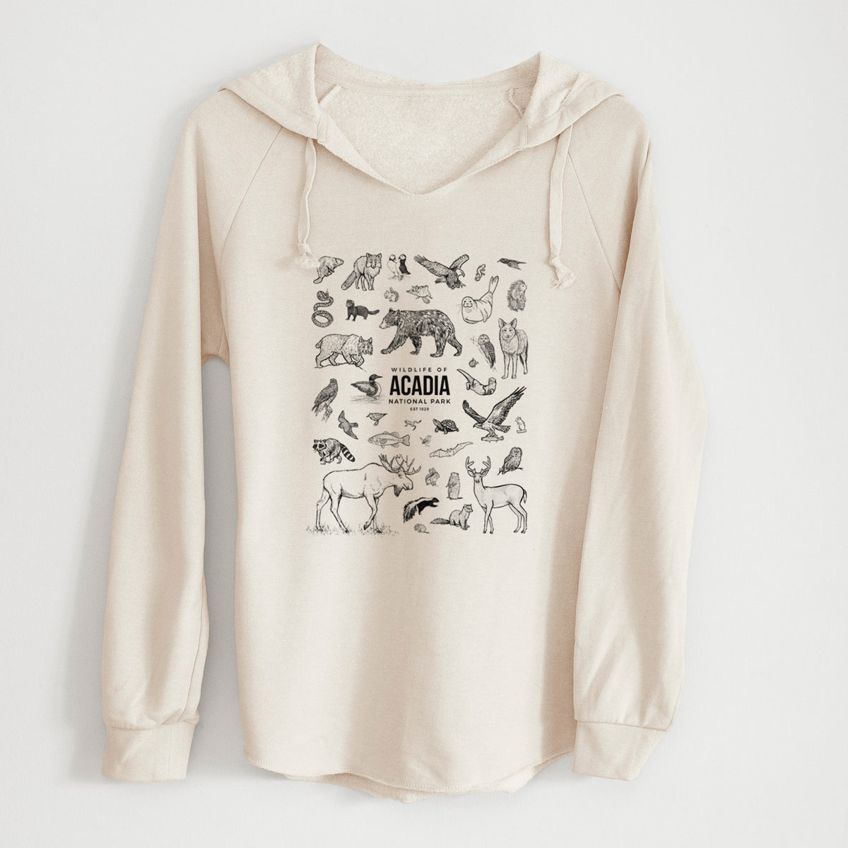 Bone cream women's Cali Wave hooded sweatshirt laid flat, printed with a collection of black ink wildlife illustrations surrounding the words Acadia National Park.