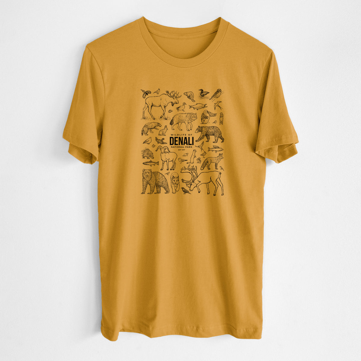 Honeycomb yellow lightweight cotton t-shirt laid flat, printed with a collection of black ink wildlife illustrations surrounding the words Denali National Park.
