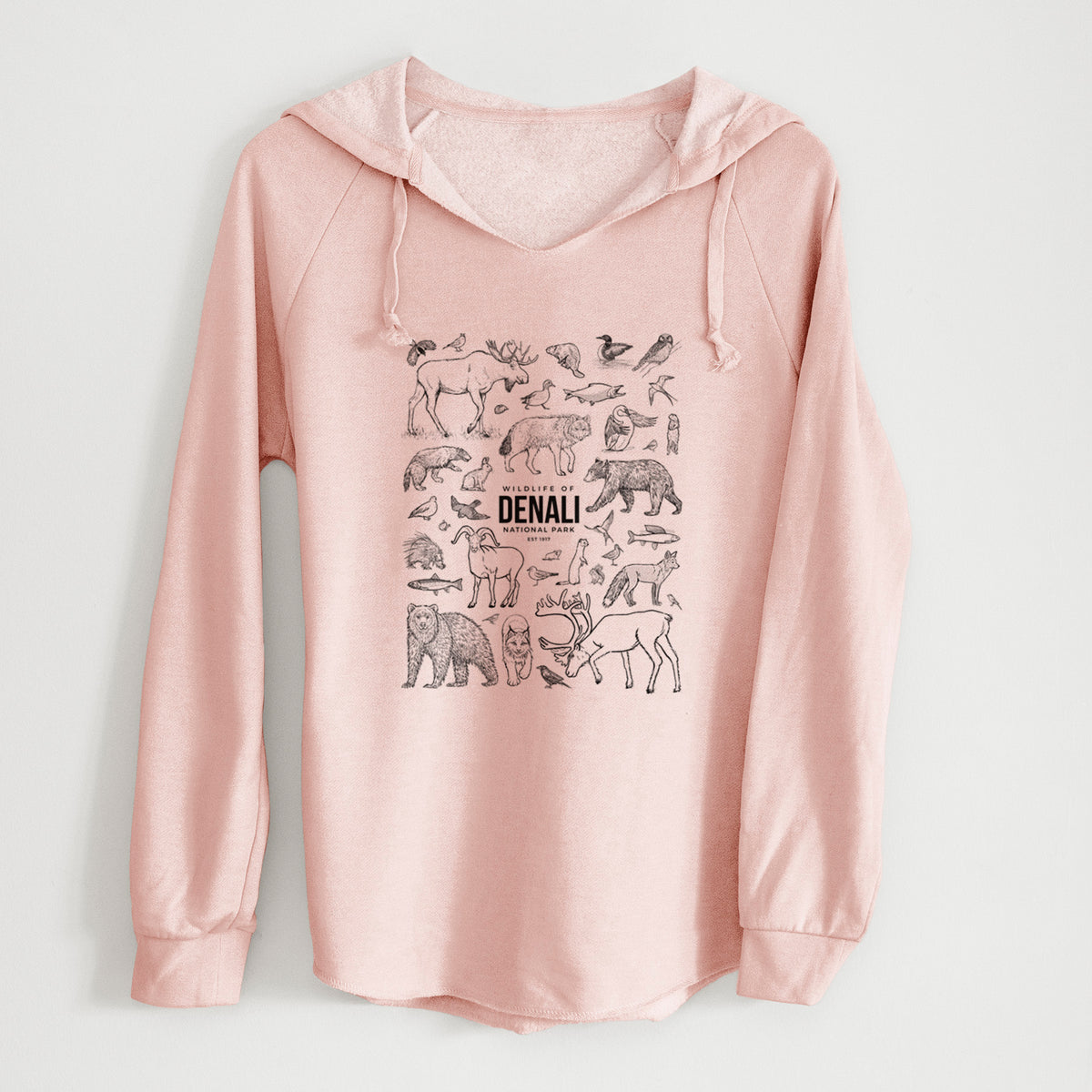 Blush pink women's Cali Wave hooded sweatshirt laid flat, printed with a collection of black ink wildlife illustrations surrounding the words Denali National Park.