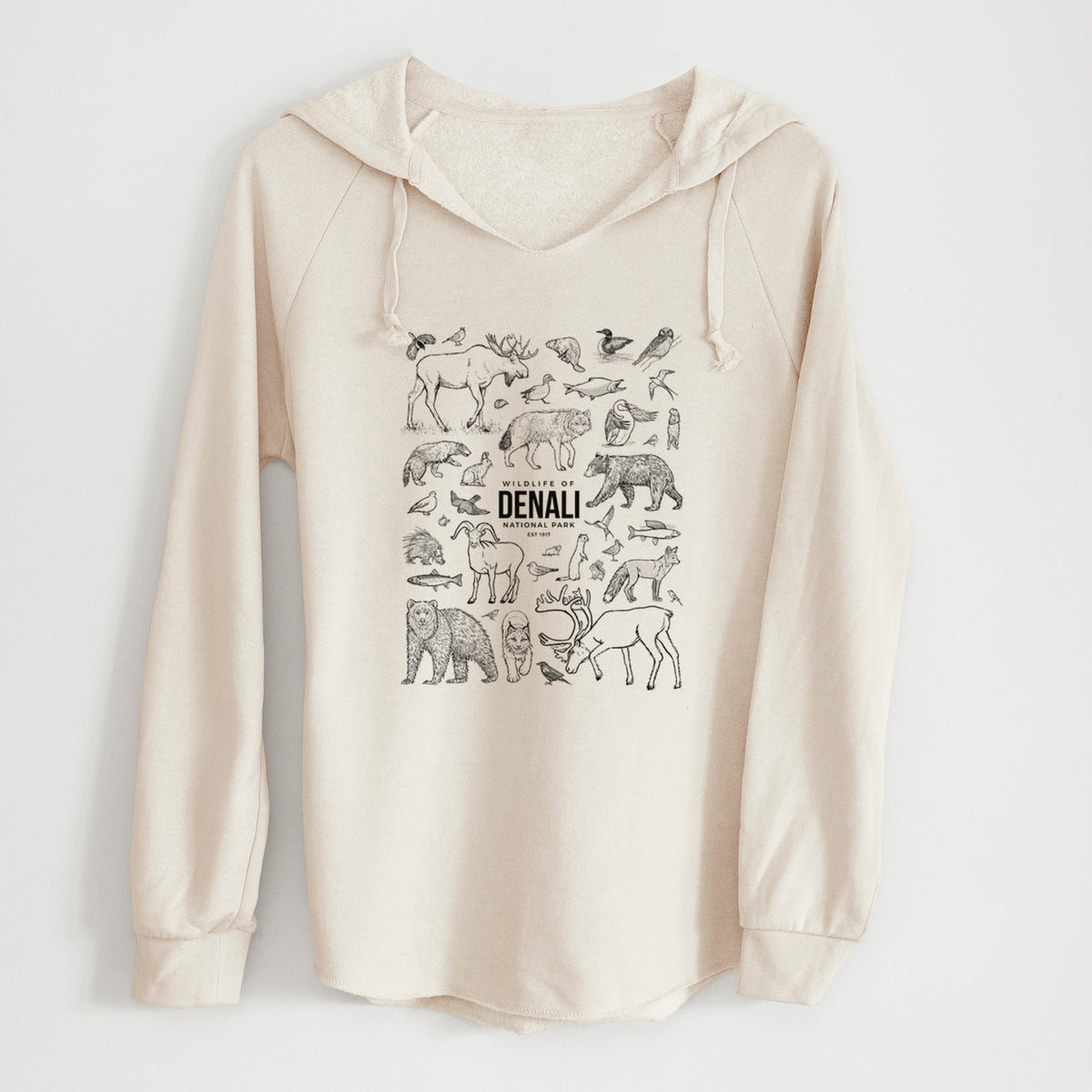 Bone cream women's Cali Wave hooded sweatshirt laid flat, printed with a collection of black ink wildlife illustrations surrounding the words Denali National Park.