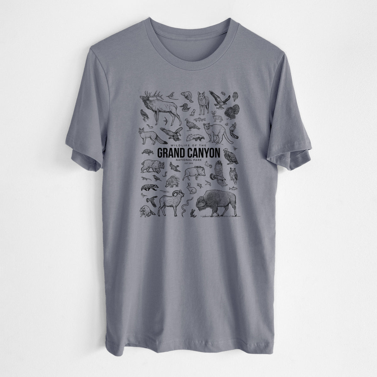 Storm grey lightweight cotton t-shirt laid flat, printed with a collection of black ink wildlife illustrations surrounding the words Grand Canyon National Park.