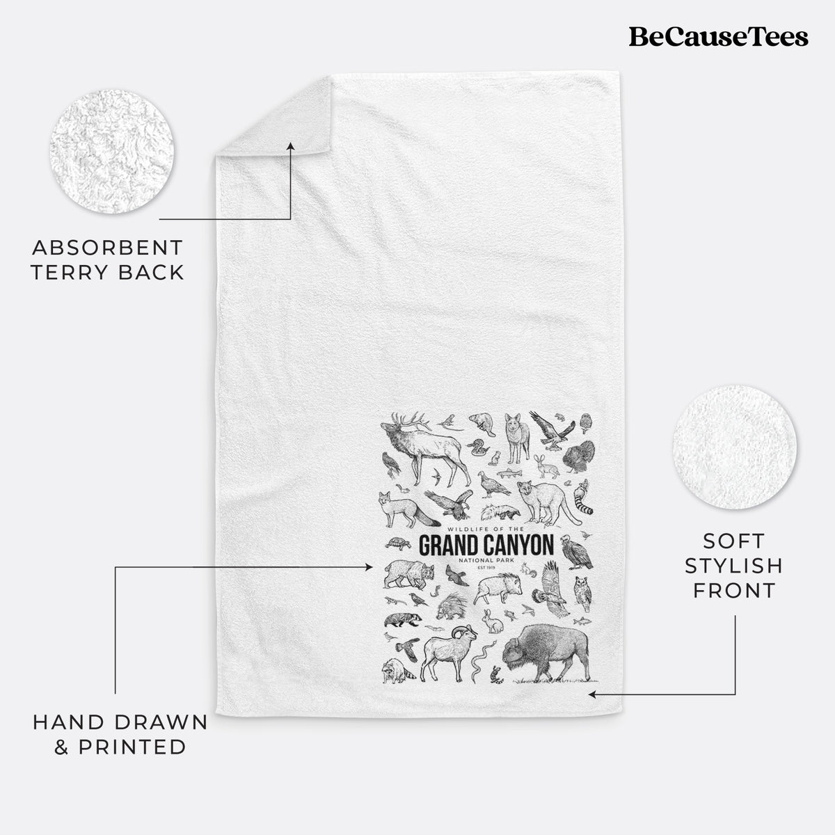 White hand towel printed with a collection of black ink wildlife illustrations surrounding the words Grand Canyon National Park.