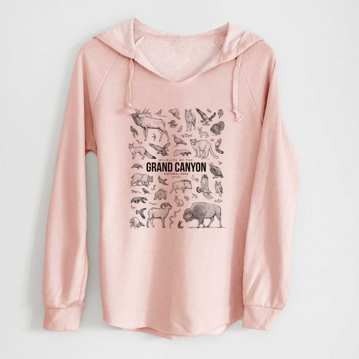 Blush pink women's Cali Wave hooded sweatshirt laid flat, printed with a collection of black ink wildlife illustrations surrounding the words Grand Canyon National Park.