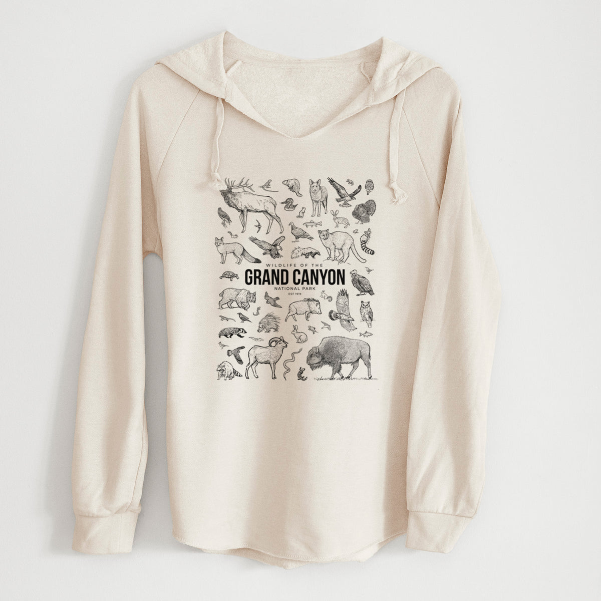 Bone cream women's Cali Wave hooded sweatshirt laid flat, printed with a collection of black ink wildlife illustrations surrounding the words Grand Canyon National Park.